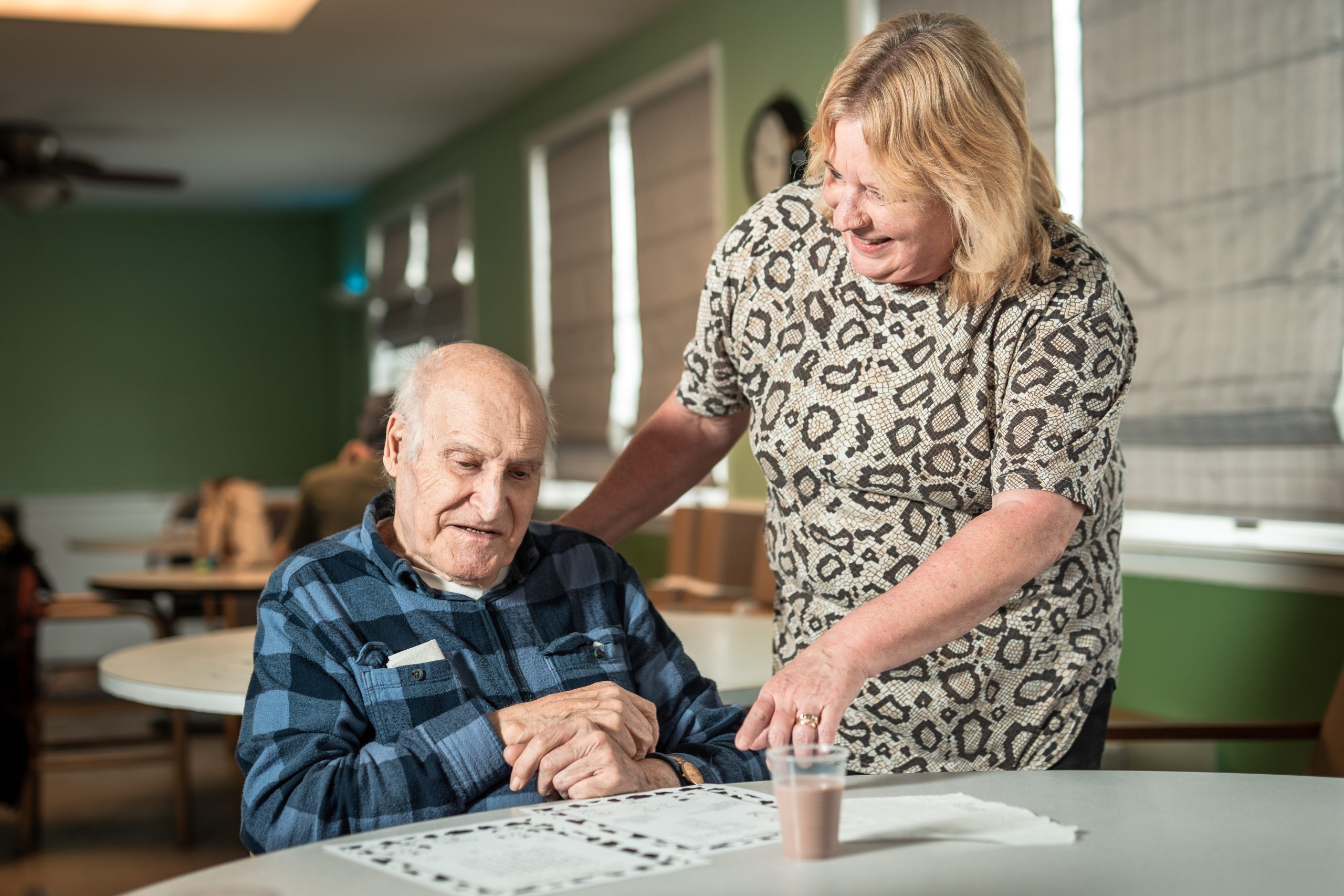 resident and staff interacting